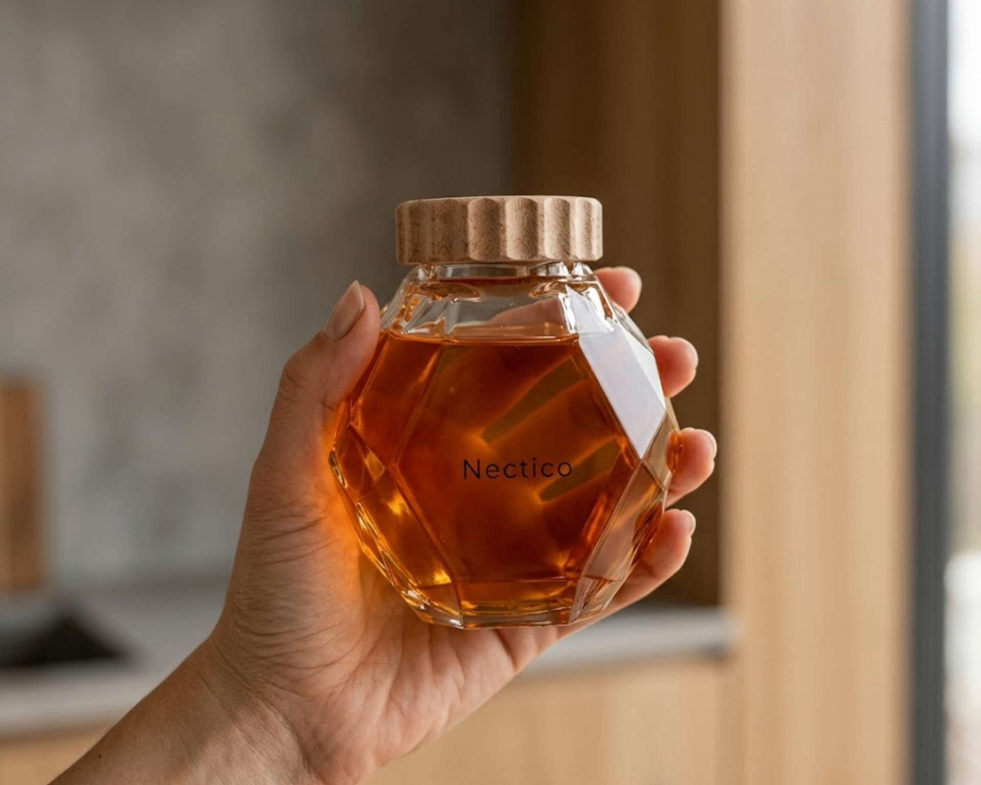 NECTICO honey jar held to the light